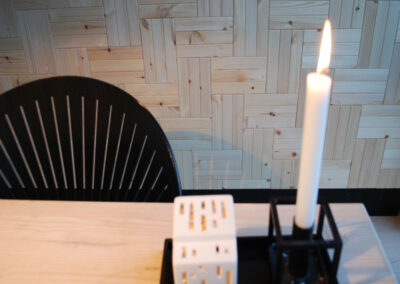 Wooden wall decoration in a herringbone pattern in a kitchen