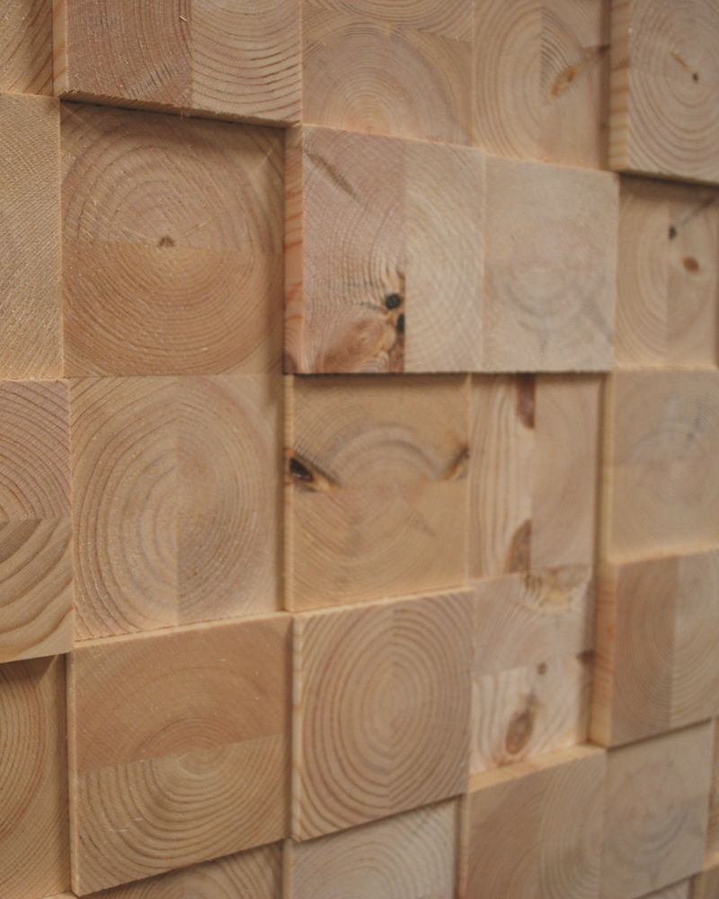 Untreated face blocks of wood in a square pattern